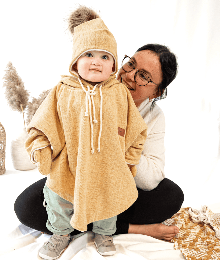 Poncho et accessoires avec pompon